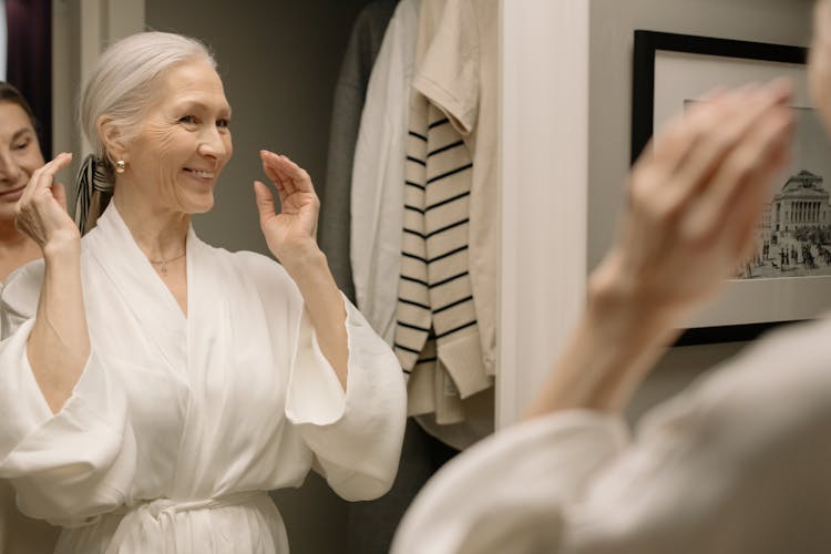 Women Getting Ready In Bathroom