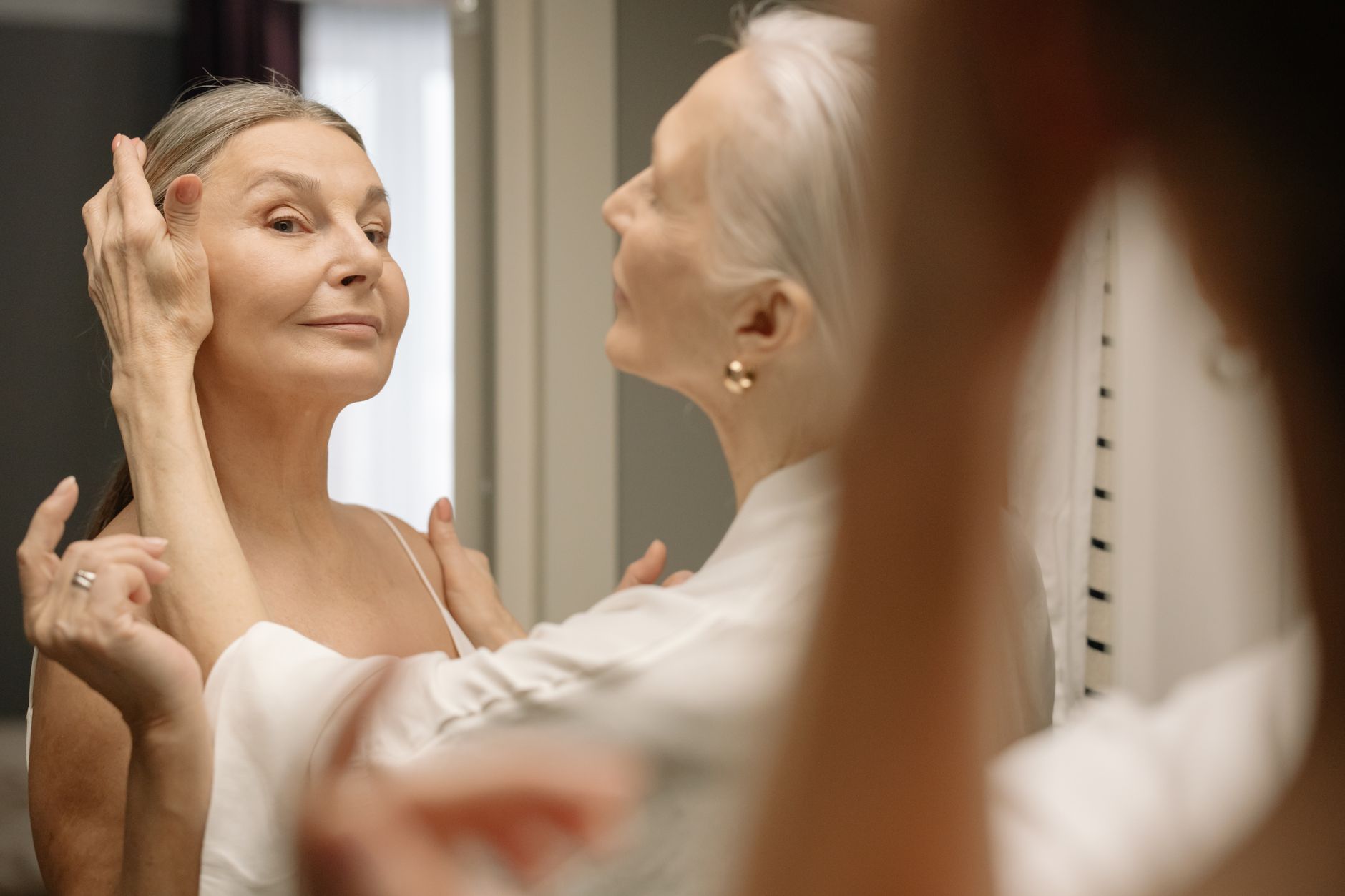 mature woman makeup mirror