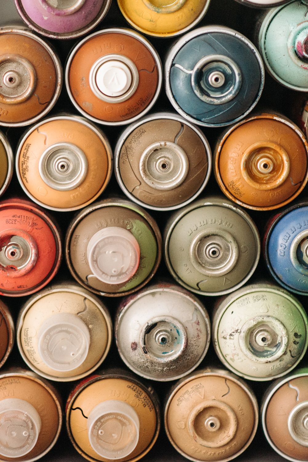 Overhead Shot of Spray Cans · Free Stock Photo