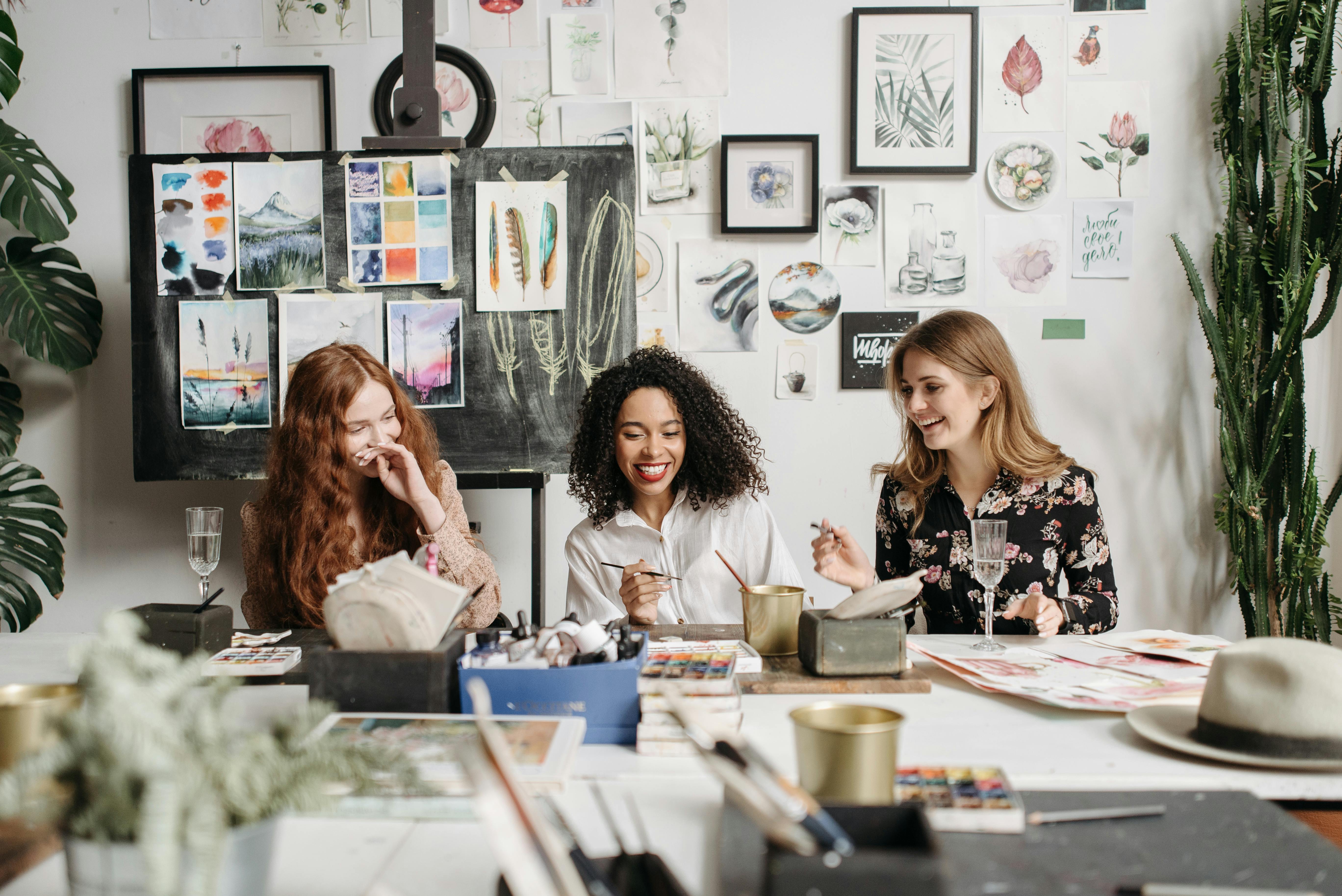 3 women at the painting class