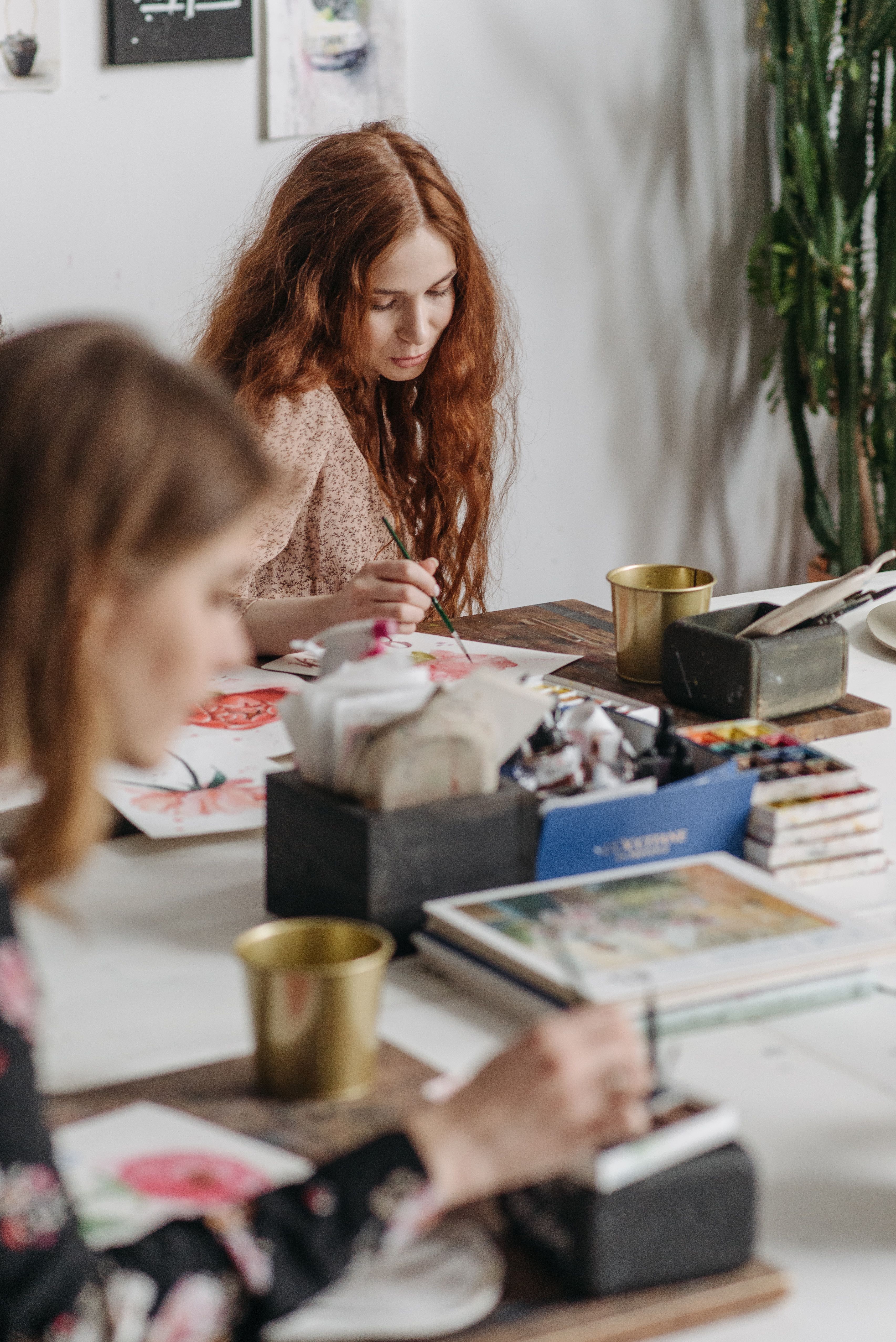 A Young Woman Painting in an Art Class · Free Stock Photo