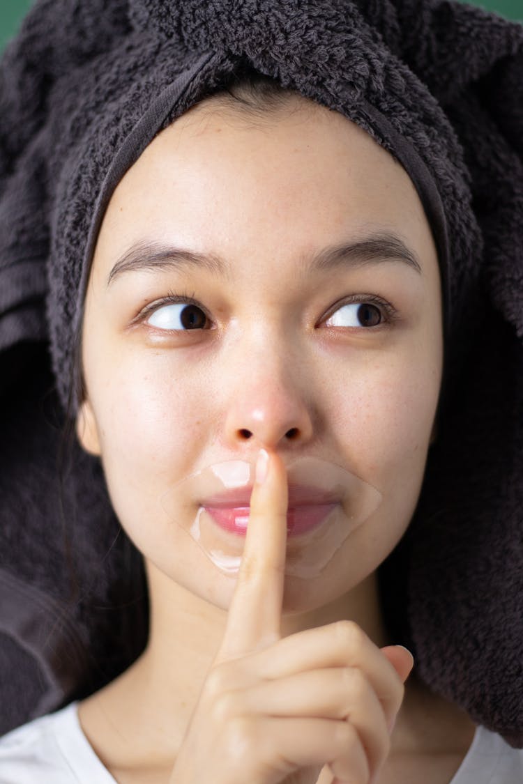 Woman Using A Lip Mask