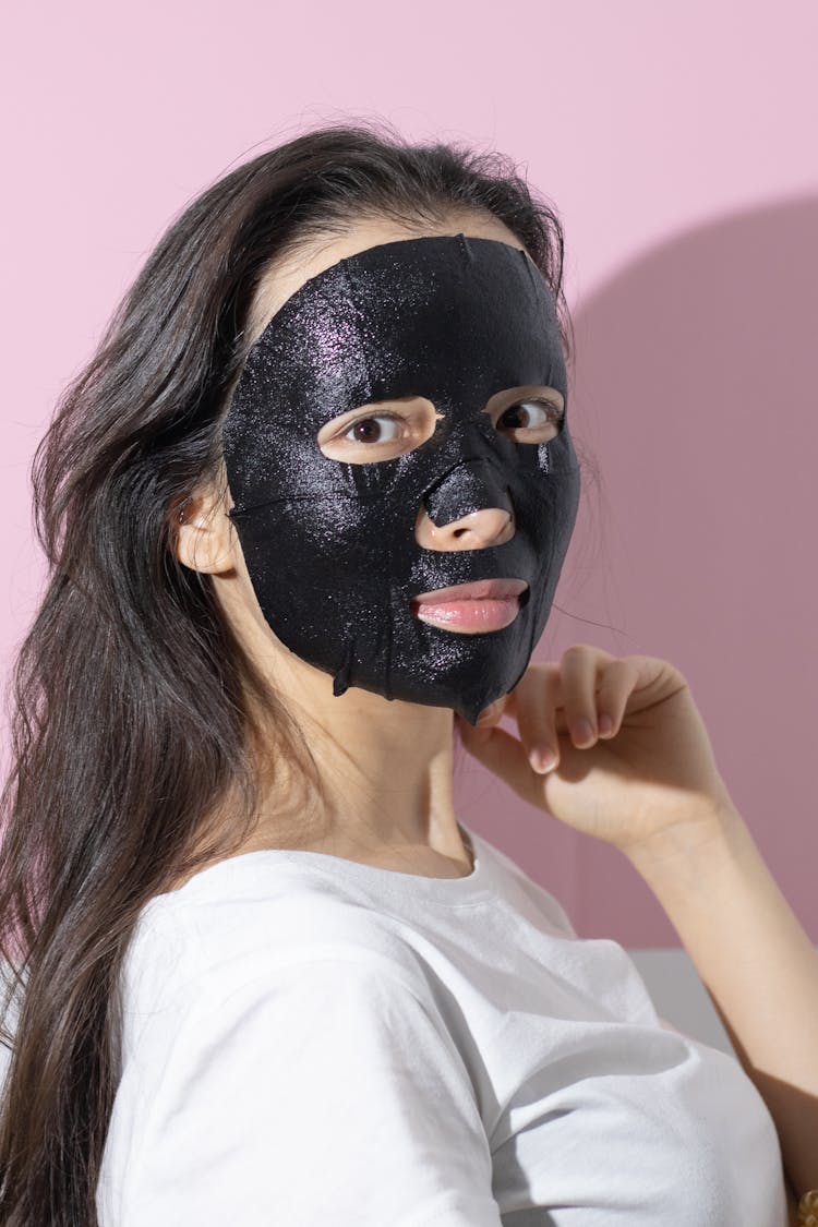 Woman With Black Mud Mask
