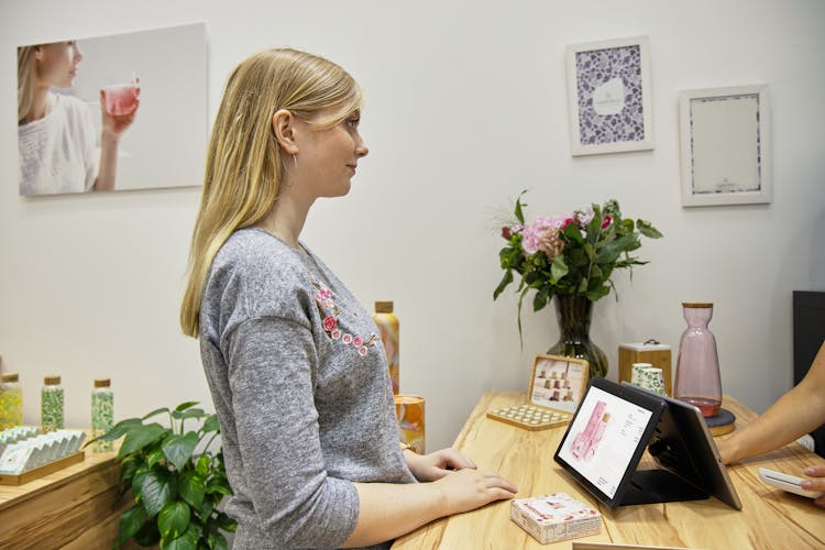 Woman At Reception In Spa Salon