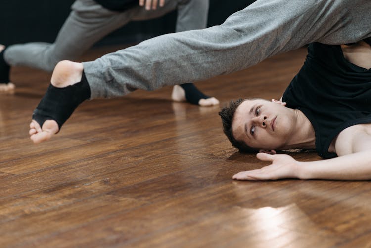 Good Looking Man Doing Bending Exercise