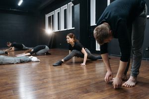 Long hold stretch on wooden flooring — photo by Pavel Danilyuk on Pexels