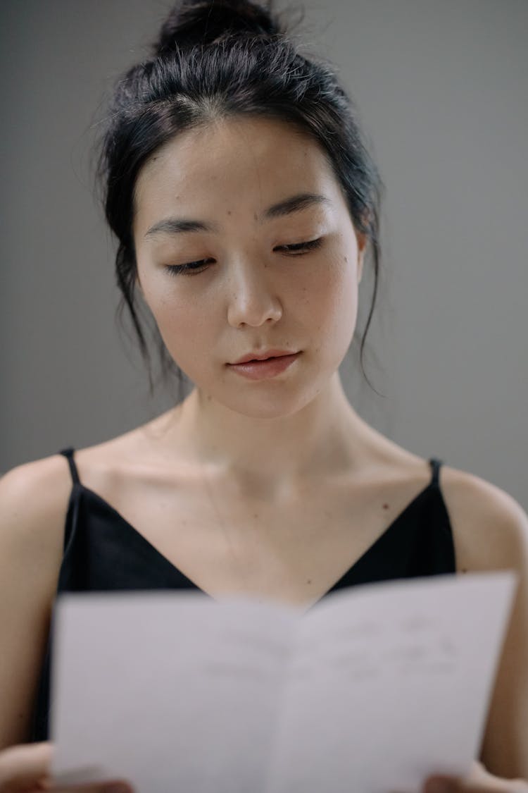 Beautiful Woman Reading A Letter