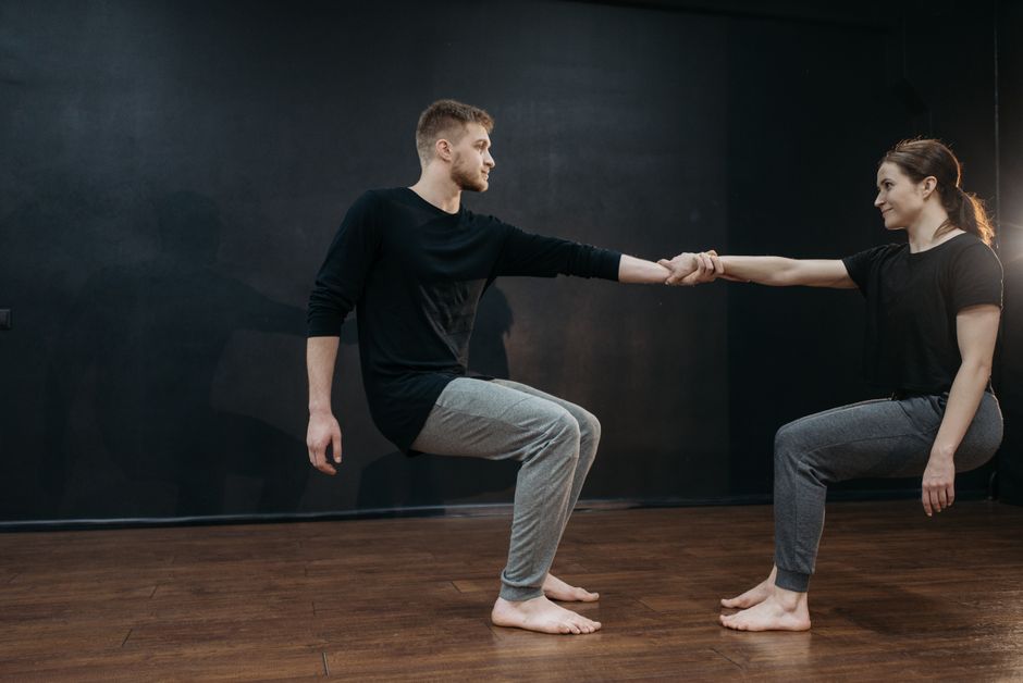 a couple practicing structured communication exercises during a therapy session a couple practicing structured communication exercises during a therapy session