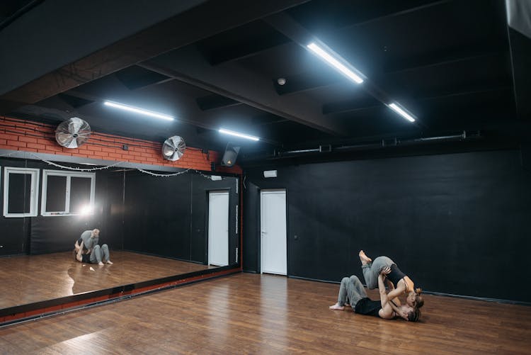 Couple Rehearsing In A Dance Studio