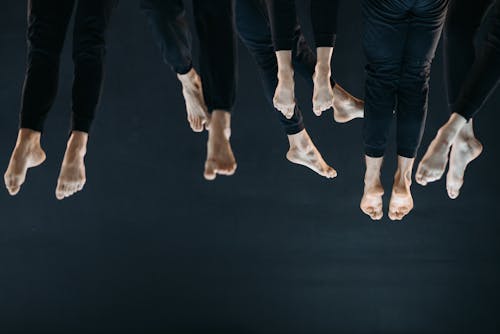 Barefoot People in Black Leggings