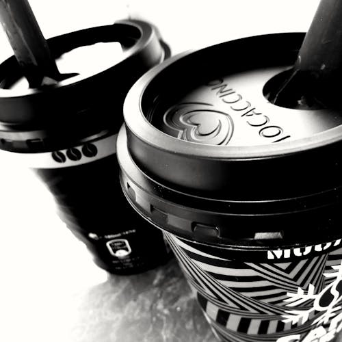 Monochrome Photo of Two Cups of Coffee