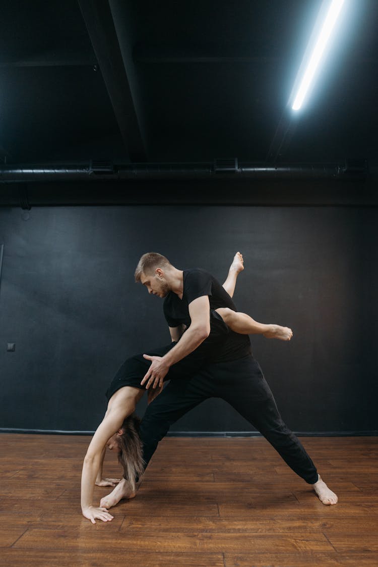 Couple Dancing At A Dance Studio