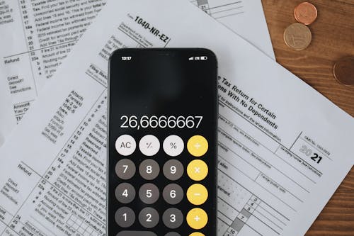 Free Tax Forms And Calculator In Close up View Stock Photo