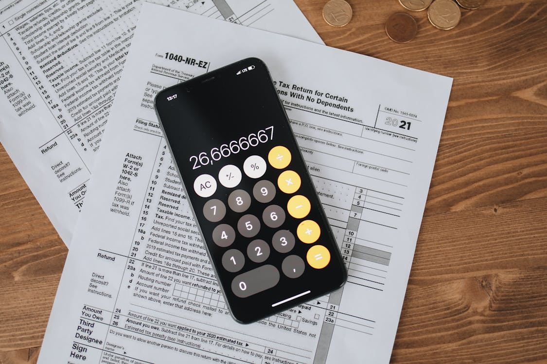 Black Calculator onIncome Tax Forms