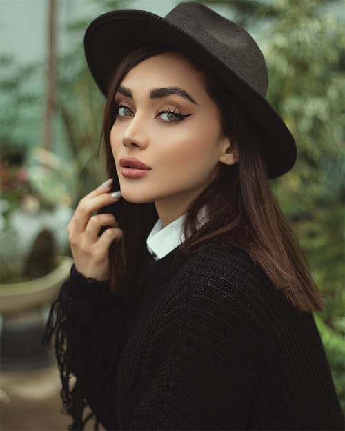 Portrait of an Attractive Woman in Black Sweater 