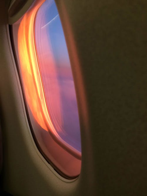 Shot of a Plane Window at Sunset