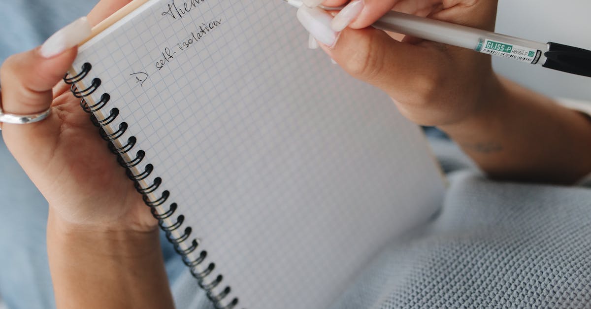 Student Writing Notes on Her Notebook · Free Stock Photo