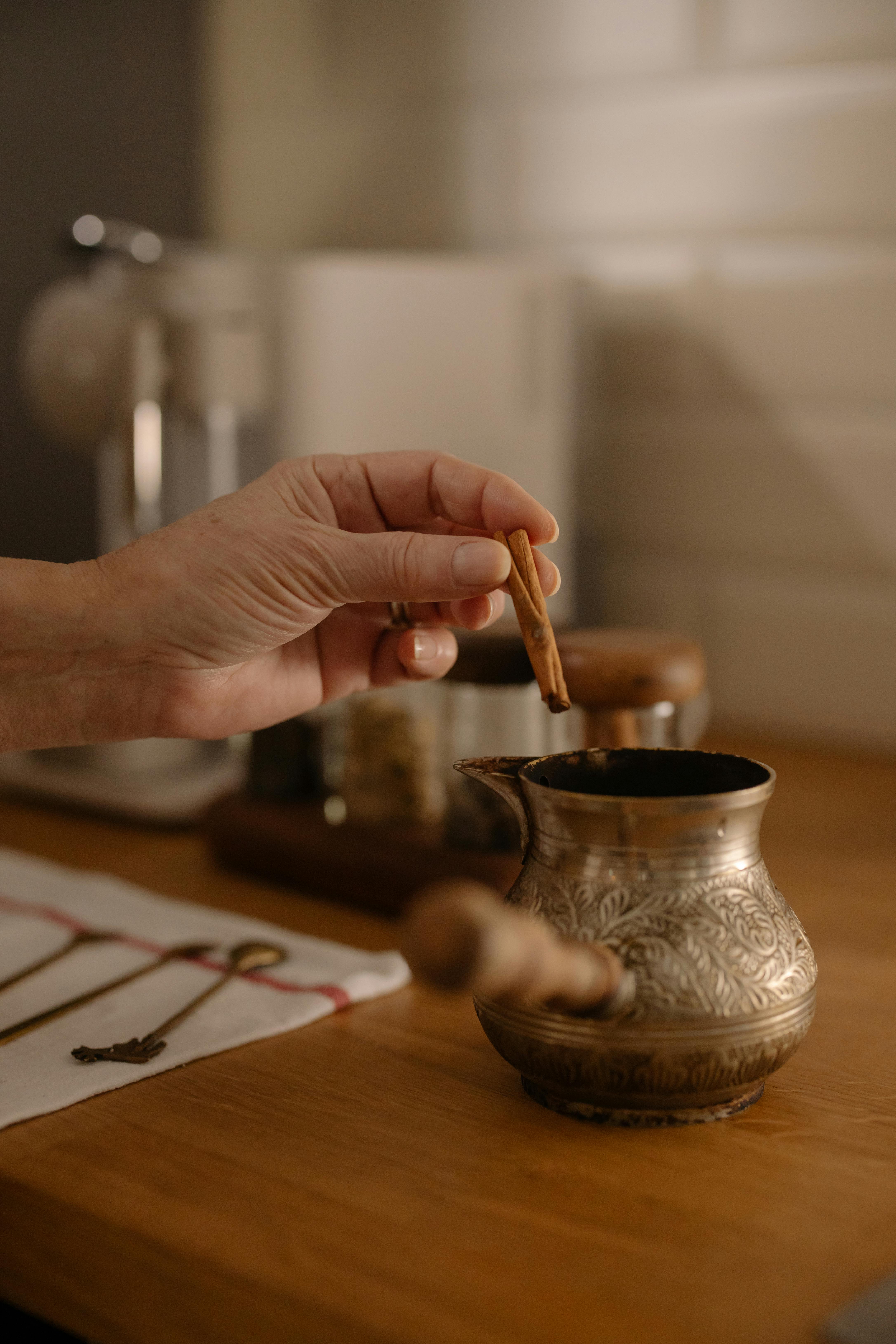 Hot coffee In Moka Pot on electric stove ,vintage coffee maker on wooden  table at home, Selective focus. 6965677 Stock Photo at Vecteezy