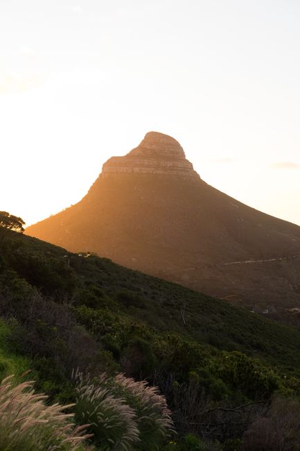 Stunning view of Lion's Head mountain during sunset in Cape Town, South Africa.