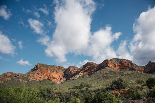 Explore the rugged mountain range under a clear blue sky in Western Cape, South Africa.