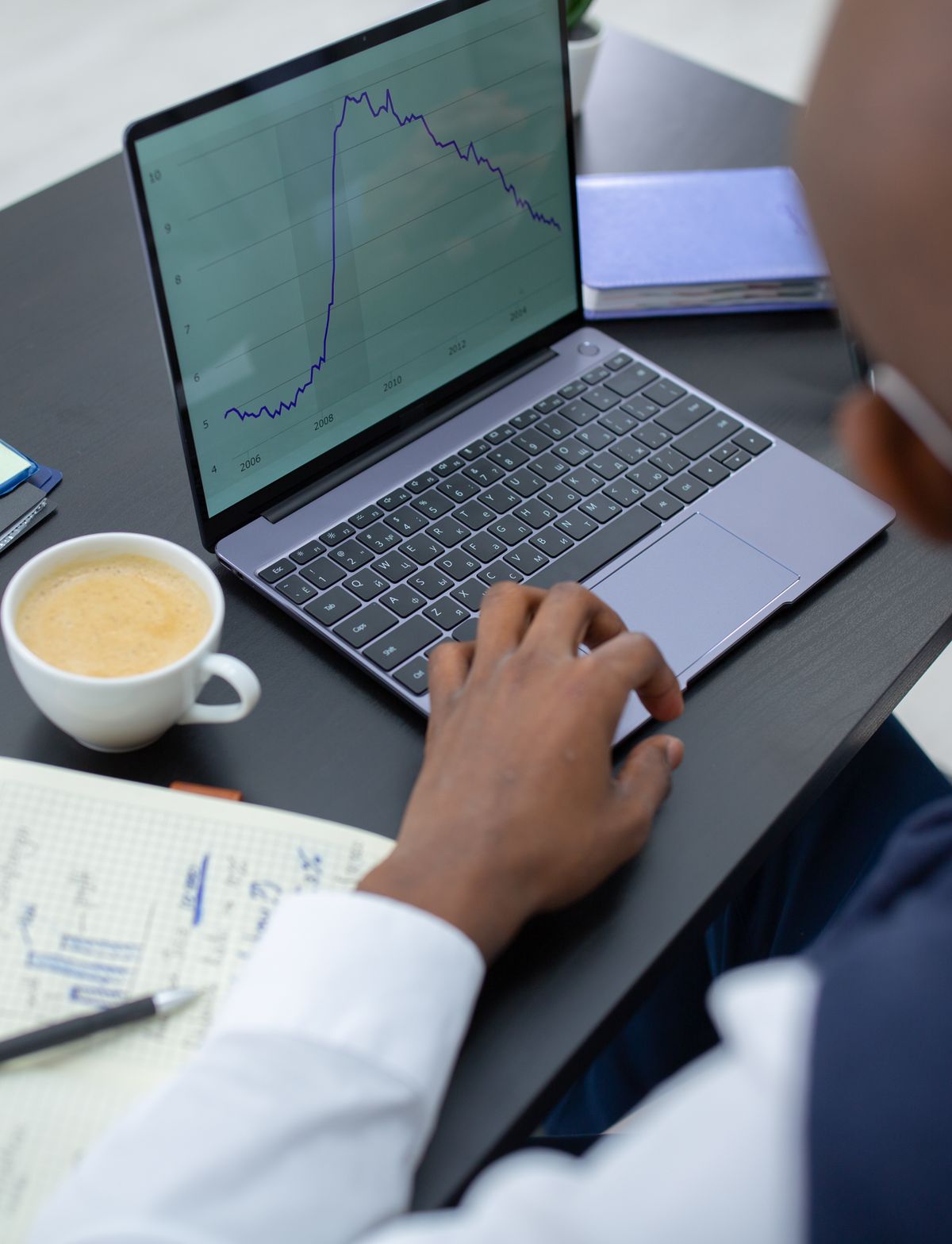 Independent financial comparison and market research on a laptop