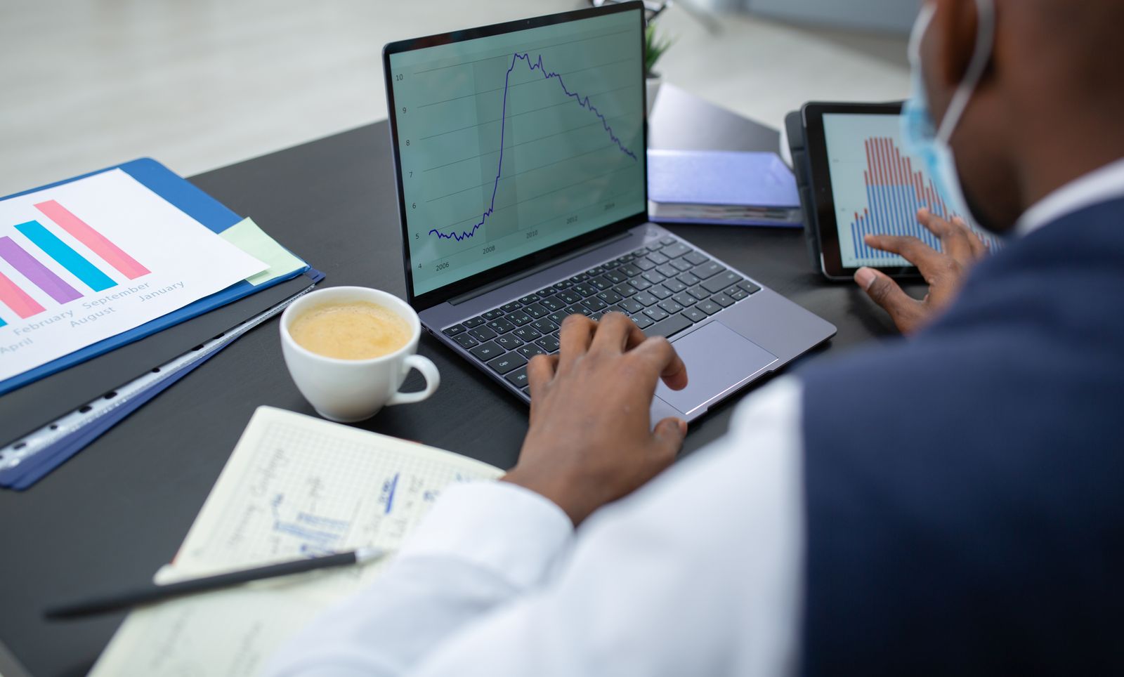 Professional reviewing business analytics during a consultation