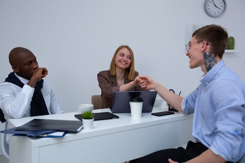 Man and a Woman Shaking Hands