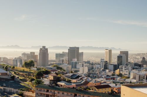 Free Stunning aerial view of Cape Town's skyline with clear skies and urban architecture. Stock Photo
