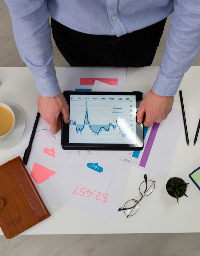 Reviewing fund figures on a tablet — photo by Mikhail Nilov on Pexels