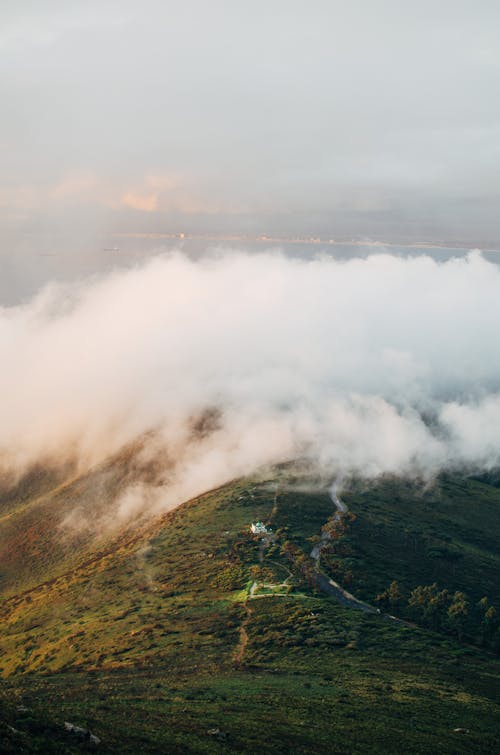 Green Mountain Covered with White Clouds