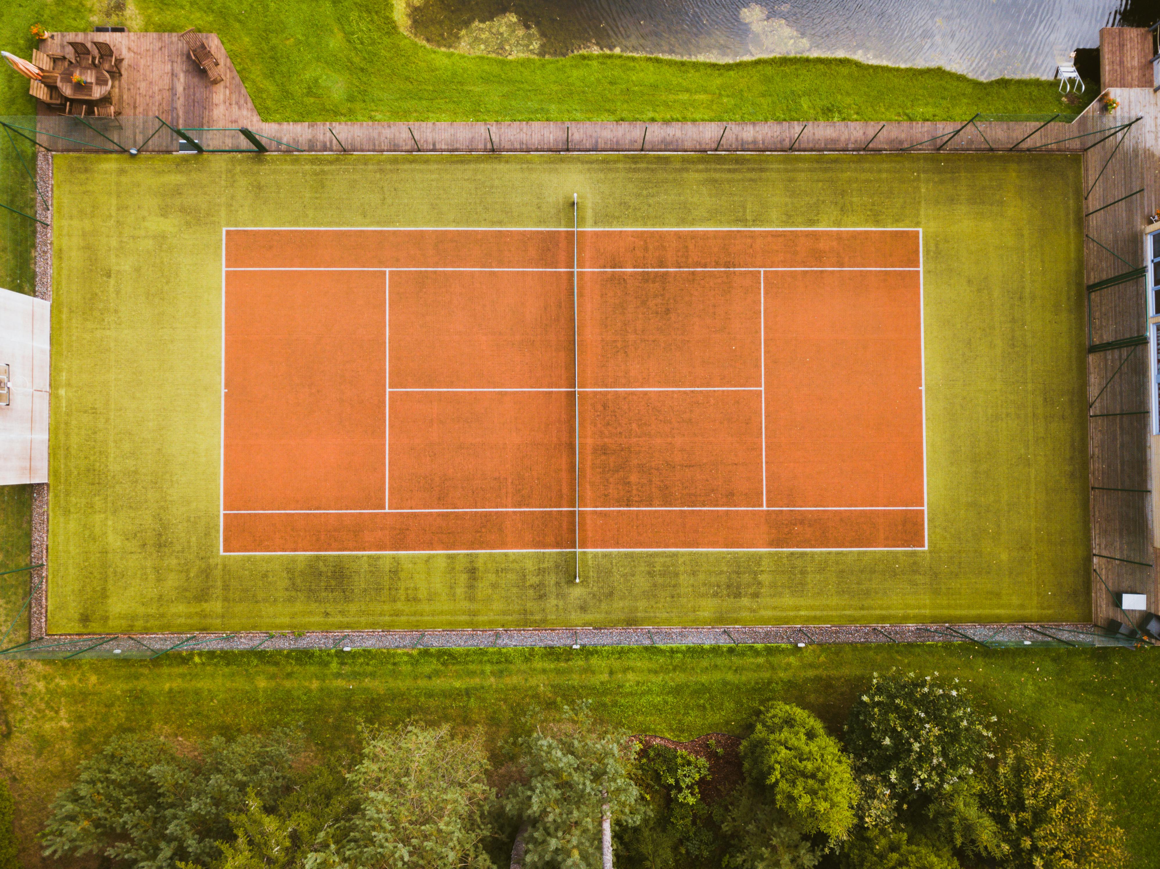 Aerial Photography of a Tennis Court · Free Stock Photo