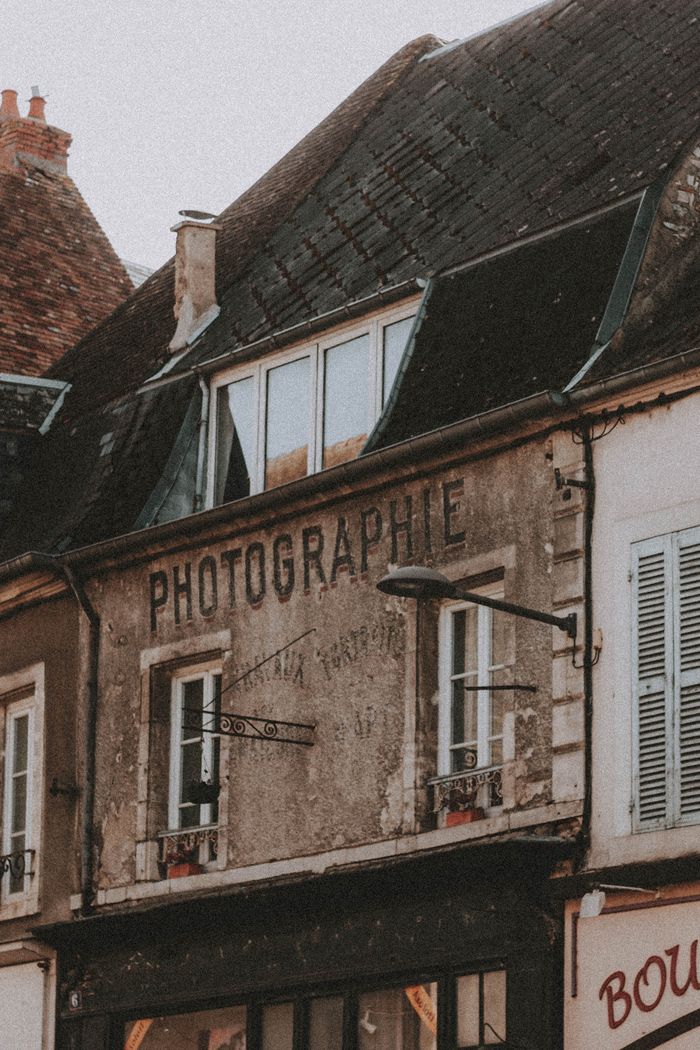 Painted lettering on a weathered stone wall — photo by Mathias Reding on Pexels