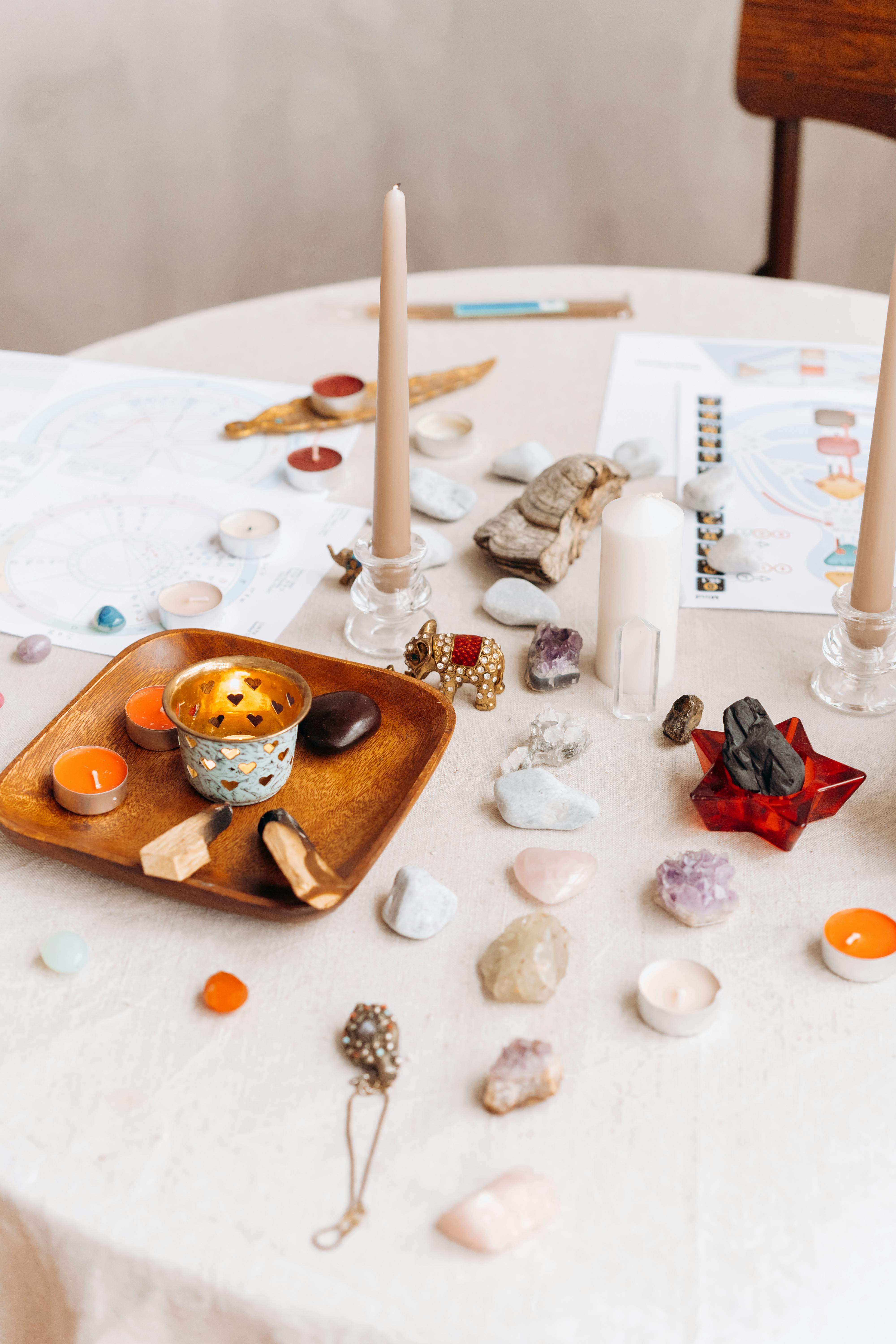 Brown Wooden Tray With White Candles on White Table Cloth