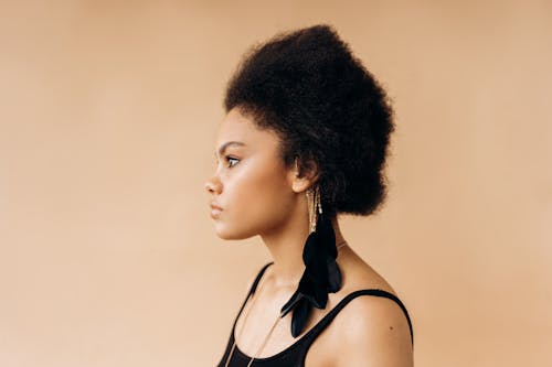 Free Side View of a Woman with Afro Hair Stock Photo