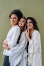Woman in White Long Sleeve Shirt Hugging Woman in White Long Sleeve Shirt