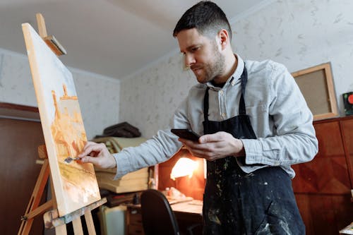 Man Painting with a Palette Knife