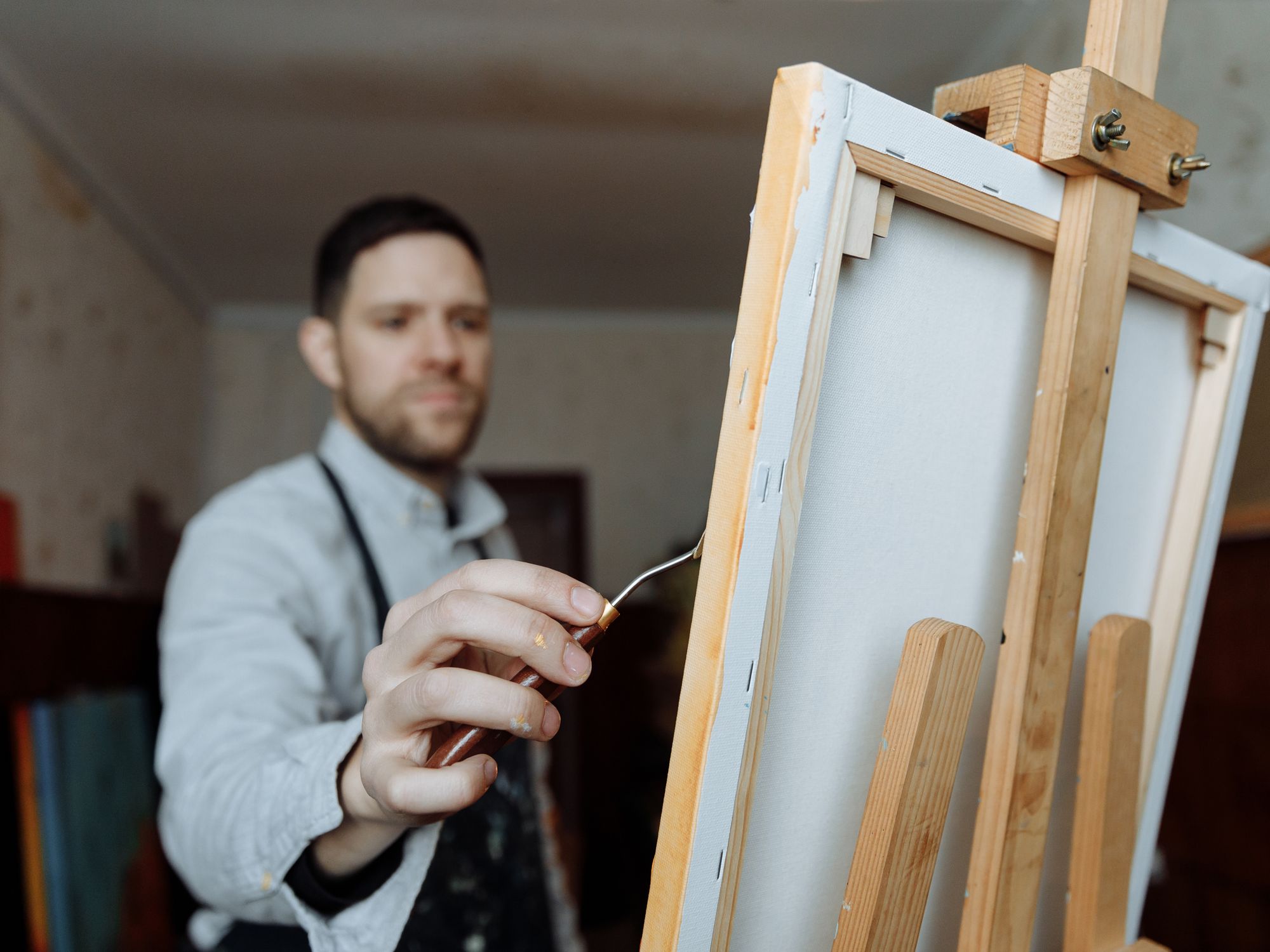 Masonry and Render Painting in Plaistow, Newham — professional painter and decorator at work