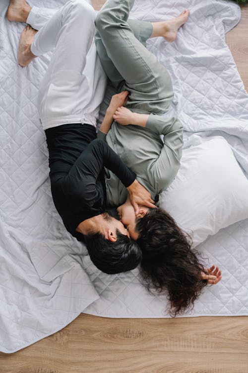 Free Couple Lying on a Blanket Stock Photo
