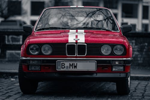 A Parked  Vintage Red BMW  