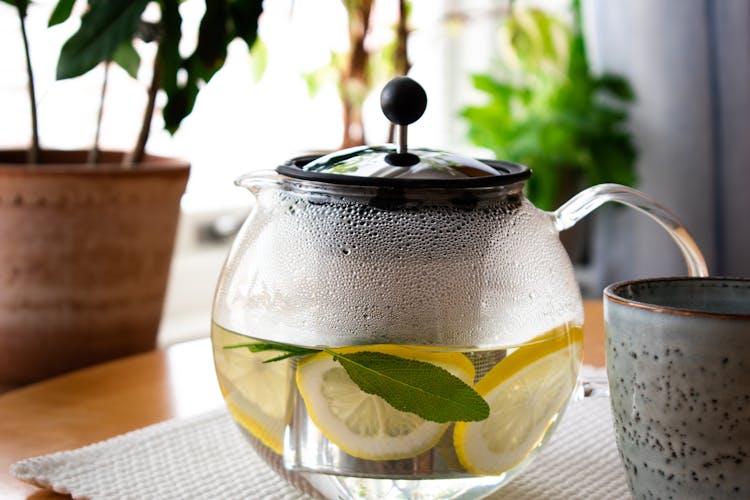 Water With Lemon Slices In Pitcher