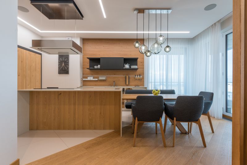 Contemporary kitchen with wooden cabinetry — photo by Max Vakhtbovych on Pexels