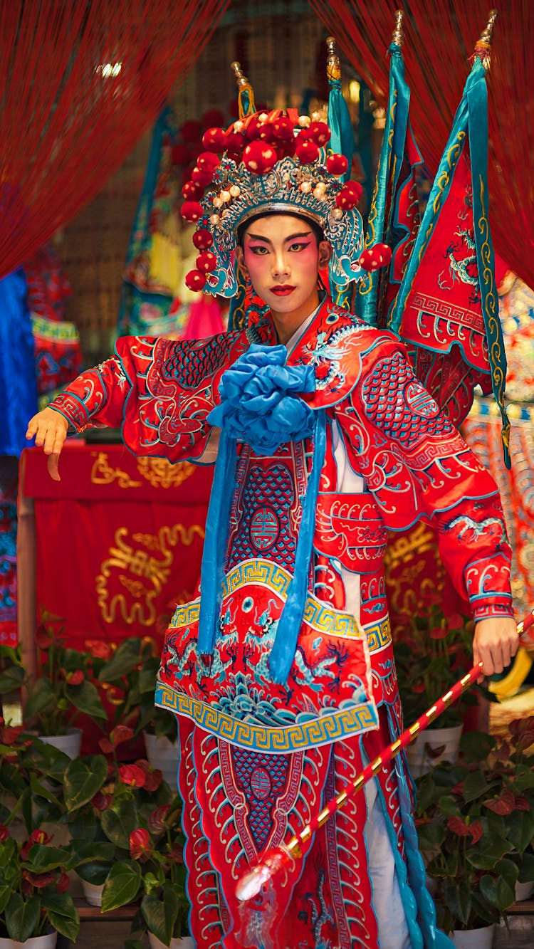 Asian Actor In Traditional Costume With Bright Ornament