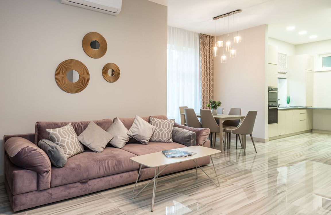 Interior of modern studio apartment with sofa in living zone · Free ...