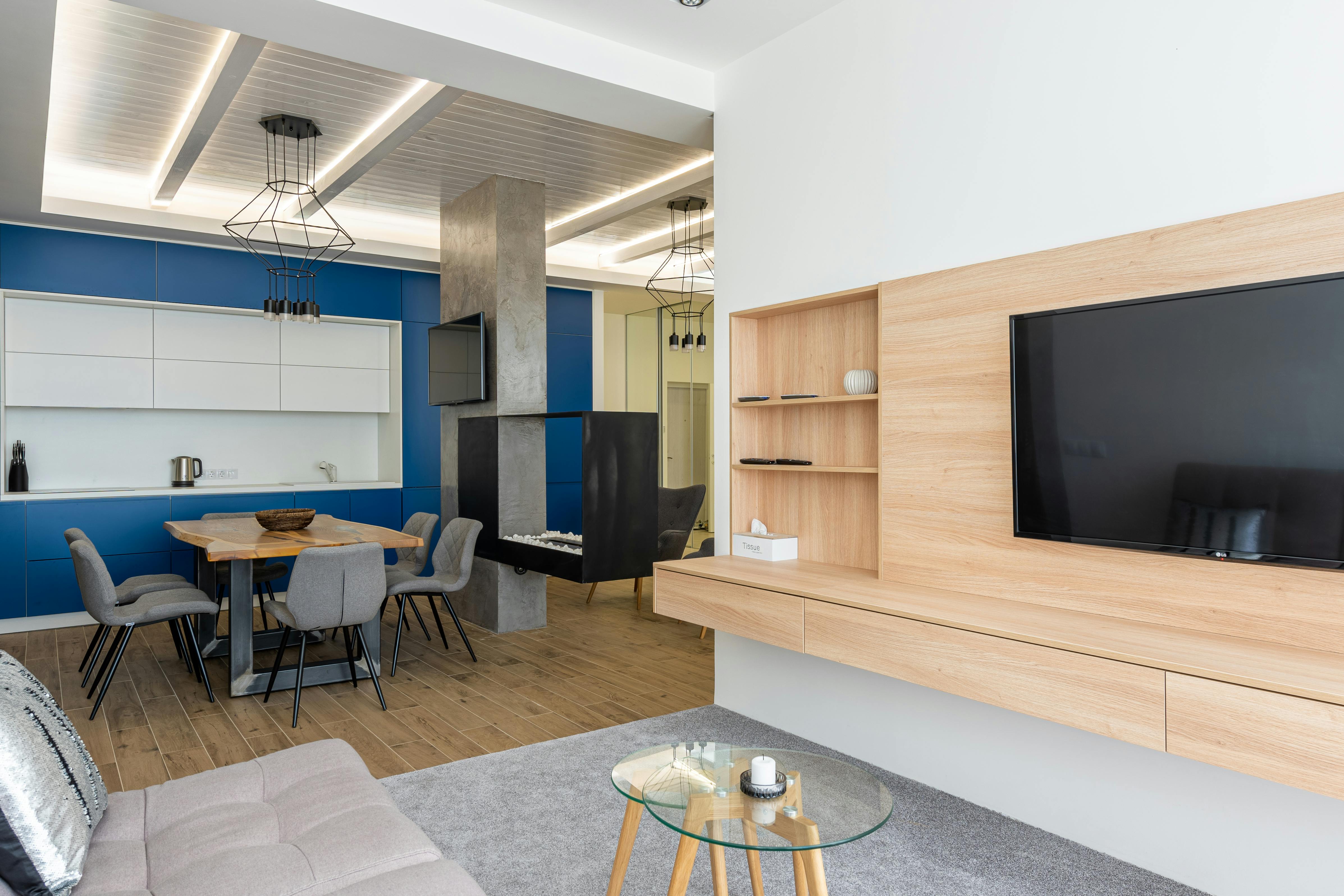 Stylish interior of studio apartment with TV set · Free Stock Photo