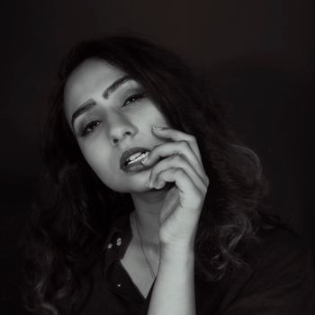 Elegant monochrome portrait of a woman with a thoughtful expression