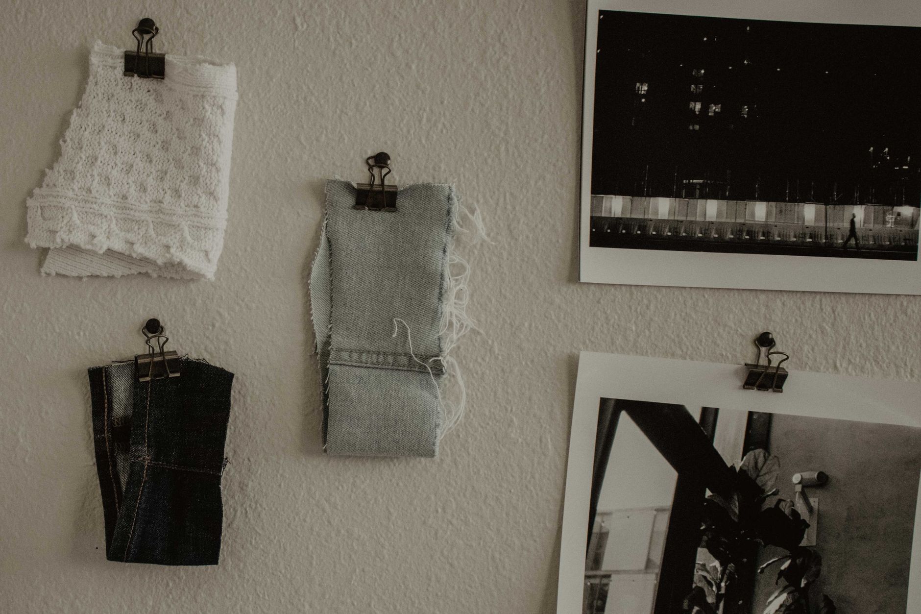 three denim fabric samples showing different levels of stretch and distortion after washing