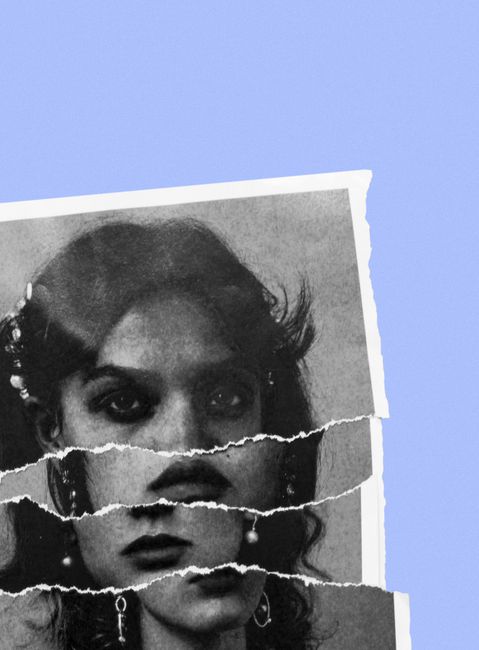 Creative torn portrait of a woman on a blue backdrop, symbolizing fragmented identity.