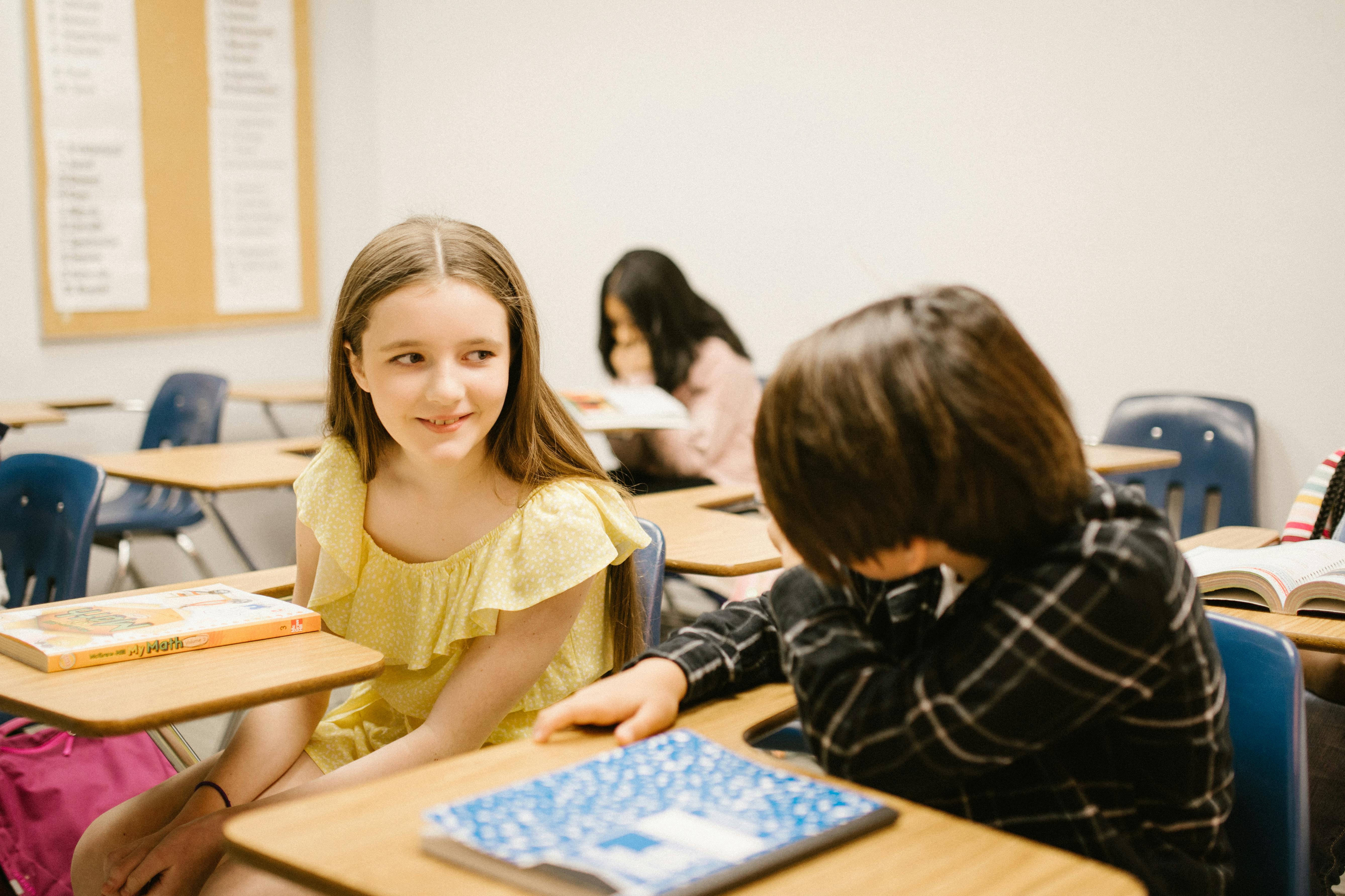 two students talking to each other