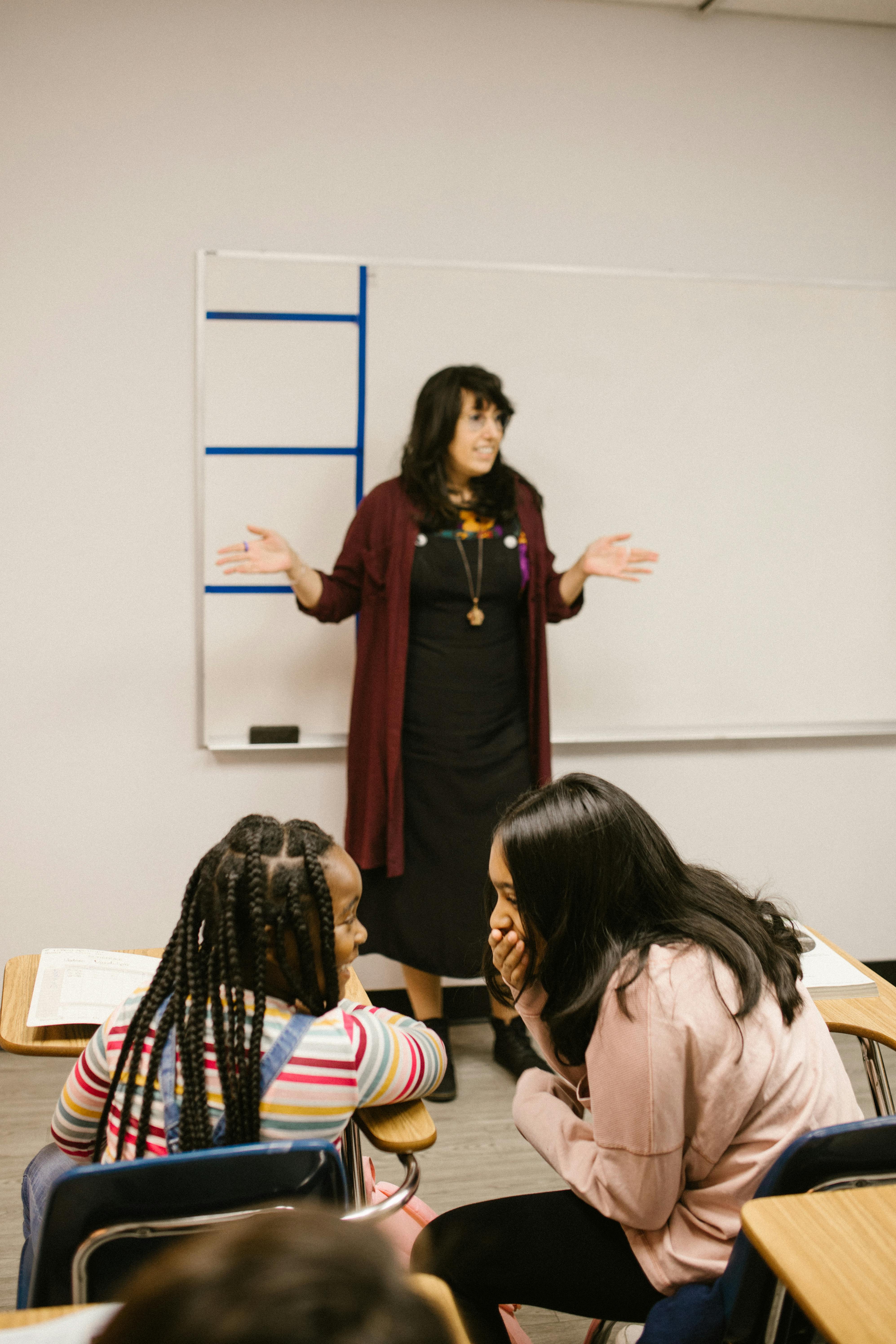 two students talking to each other