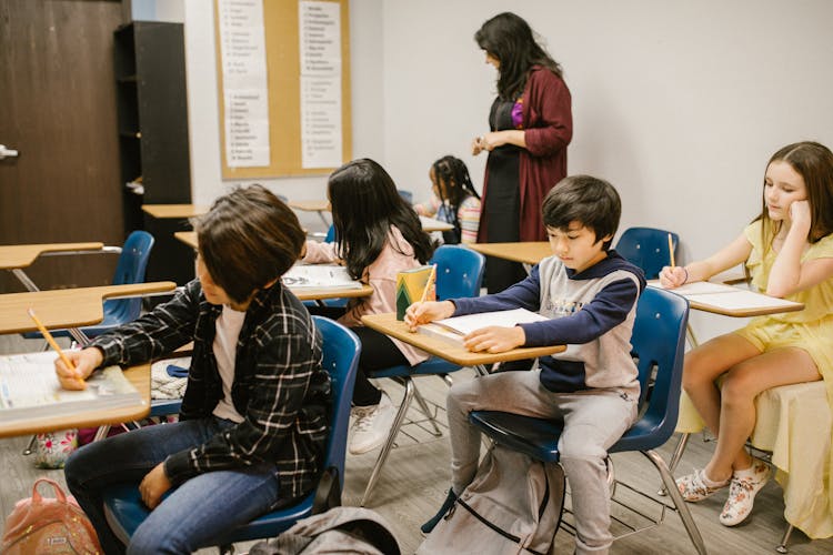 Students Studying Inside The Classroom